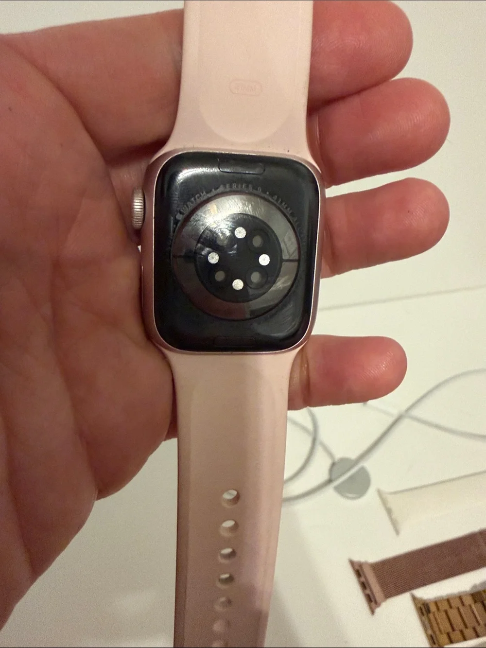 Apple Smartwatch with Light Pink Sport Band, 4 Extra Bands, and charger